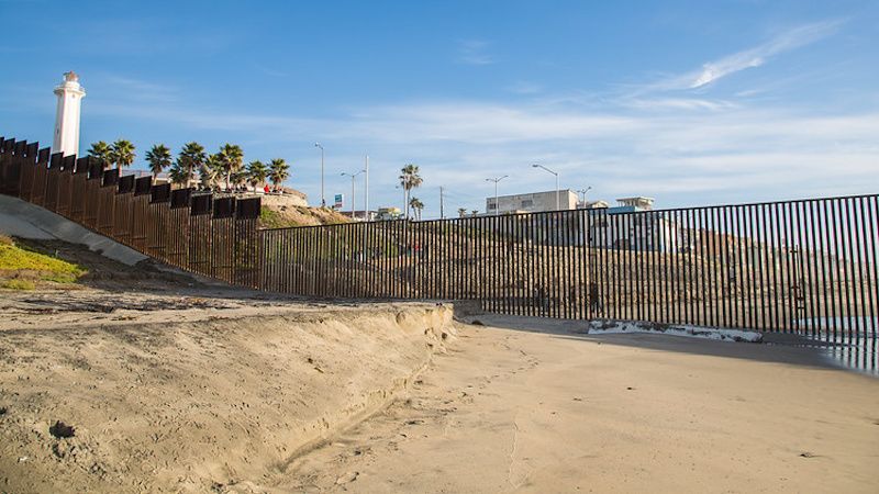 Migrants Stoned to Death, Shot at Border Wall by Smugglers