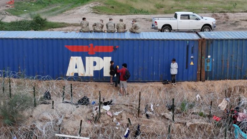 Shock Video: Soldiers Sit on Texas Container Wall as Child Crawls Through Razor Wire Feet Away