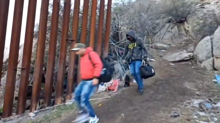 WATCH: Brazen Illegals Running Around California Border Wall After Being Dropped Off by Smugglers