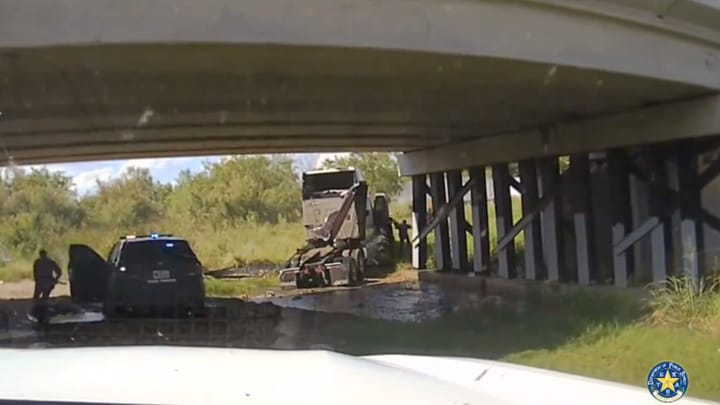 Wild Video: Human Smuggler Crashes Stolen Big Rig Into Overpass